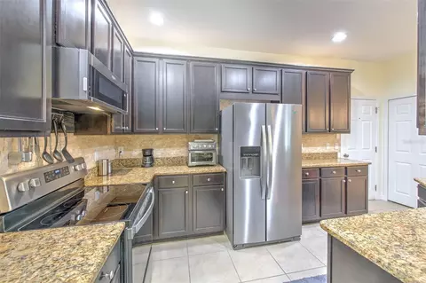 Kitchen - 5409 Conch Shell Pl, Apollo Beach, FL 33572 photo 1 of 3