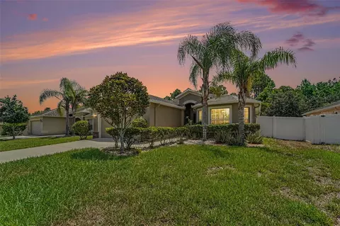 Exterior - 10048 Ives Loop, Hudson, FL 34667 photo 2 of 11