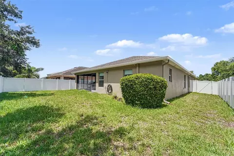 Exterior - 10048 Ives Loop, Hudson, FL 34667 photo 9 of 11