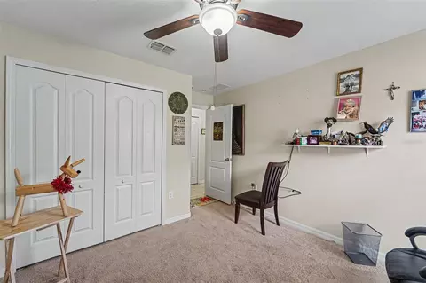 Bedroom - 10048 Ives Loop, Hudson, FL 34667 photo 5 of 6
