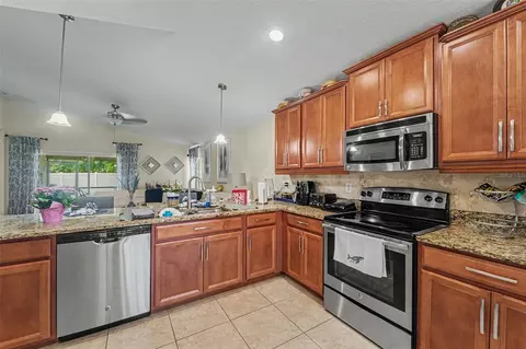 Kitchen - 10048 Ives Loop, Hudson, FL 34667 photo 2 of 3