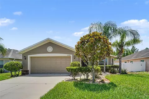 Exterior - 10048 Ives Loop, Hudson, FL 34667 photo 4 of 11