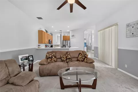 Living - 1314 Rowantree Dr, Dover, FL 33527 photo 2 of 5