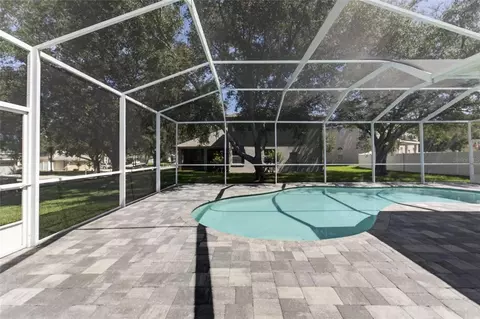 Exterior - 1314 Rowantree Dr, Dover, FL 33527 photo 5 of 21