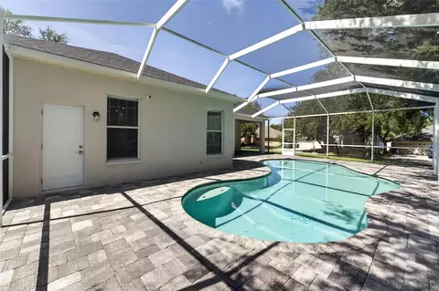 Exterior - 1314 Rowantree Dr, Dover, FL 33527 photo 11 of 21