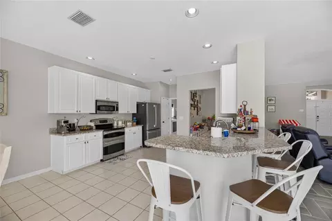 Kitchen - 12419 Riverglen Dr, Riverview, FL 33569 photo 4 of 7