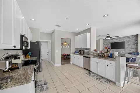 Kitchen - 12419 Riverglen Dr, Riverview, FL 33569 photo 3 of 7