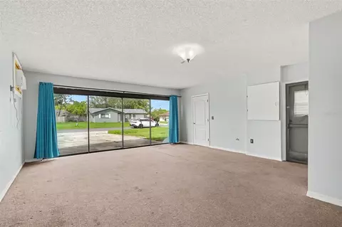 Living - 4498 Gondolier Rd, Spring Hill, FL 34609 photo 4 of 5