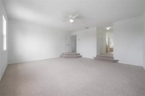 Living - 4716 Mapletree Loop, Wesley Chapel, FL 33543 photo 5 of 6