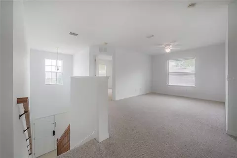 Living - 4716 Mapletree Loop, Wesley Chapel, FL 33543 photo 4 of 6