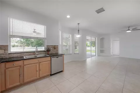 Living - 4716 Mapletree Loop, Wesley Chapel, FL 33543 photo 2 of 6