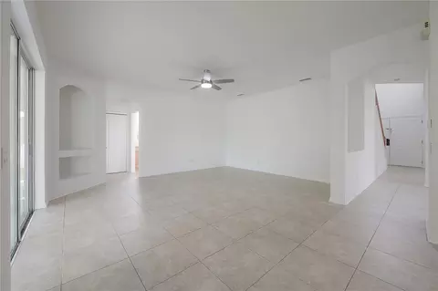 Living - 4716 Mapletree Loop, Wesley Chapel, FL 33543 photo 3 of 6