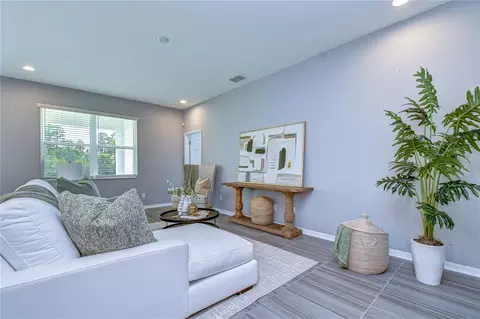 Living - 1621 Leaf Flower Ln, Lutz, FL 33558 photo 3 of 7