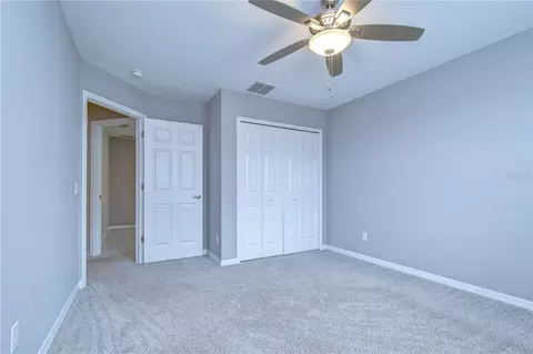 Bedroom - 1621 Leaf Flower Ln, Lutz, FL 33558 photo 6 of 7