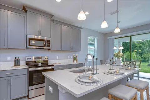 Kitchen - 1621 Leaf Flower Ln, Lutz, FL 33558 photo 6 of 8