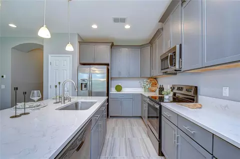 Kitchen - 1621 Leaf Flower Ln, Lutz, FL 33558 photo 3 of 8