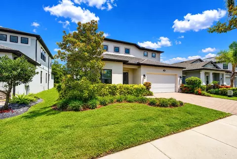 Exterior - 1621 Leaf Flower Ln, Lutz, FL 33558 photo 4 of 20
