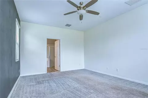 Bedroom - 1621 Leaf Flower Ln, Lutz, FL 33558 photo 2 of 7