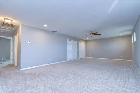 Living - 1621 Leaf Flower Ln, Lutz, FL 33558 photo 6 of 7