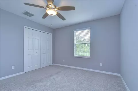 Bedroom - 1621 Leaf Flower Ln, Lutz, FL 33558 photo 4 of 7