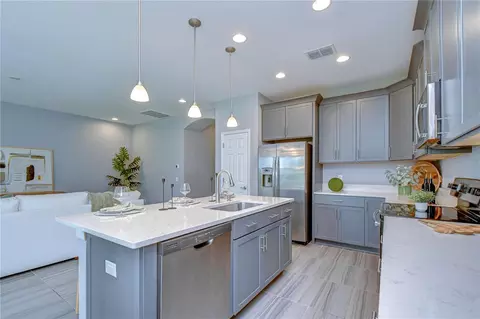 Kitchen - 1621 Leaf Flower Ln, Lutz, FL 33558 photo 2 of 8