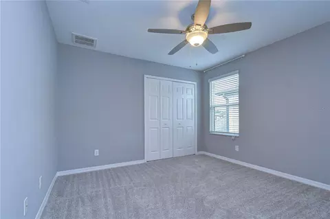 Bedroom - 1621 Leaf Flower Ln, Lutz, FL 33558 photo 7 of 7