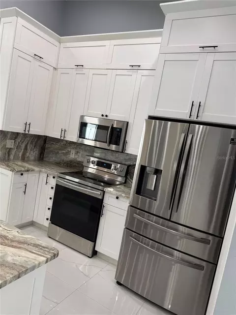 Kitchen - 4470 Gondolier Rd, Spring Hill, FL 34609 photo 3 of 3
