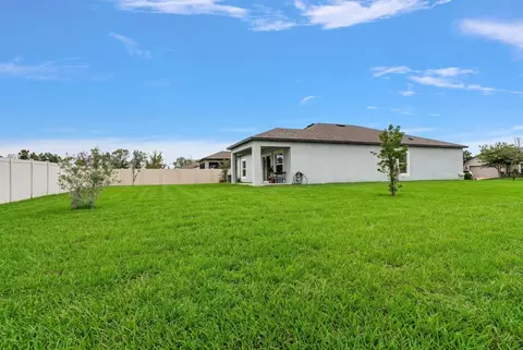 Exterior - 13120 Conquistador Loop, Spring Hill, FL 34610 photo 6 of 9