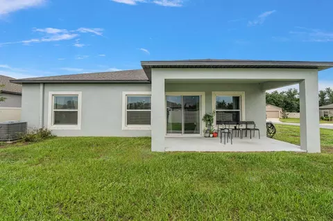 Exterior - 13120 Conquistador Loop, Spring Hill, FL 34610 photo 4 of 9