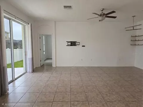 Living - 3998 Pacente Loop, Wesley Chapel, FL 33543 photo 1 of 3
