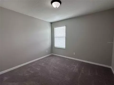 Bedroom - 4917 Eagle Rock Dr, Wimauma, FL 33598 photo 8 of 11