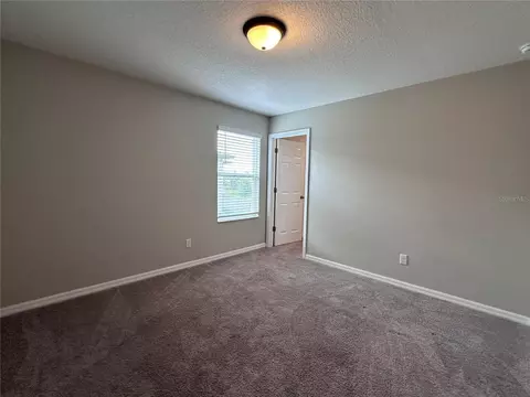 Bedroom - 4917 Eagle Rock Dr, Wimauma, FL 33598 photo 4 of 11