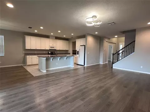 Living - 4917 Eagle Rock Dr, Wimauma, FL 33598 photo 4 of 8
