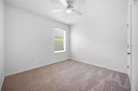 Bedroom - 5272 11th St E, Bradenton, FL 34203 photo 7 of 9