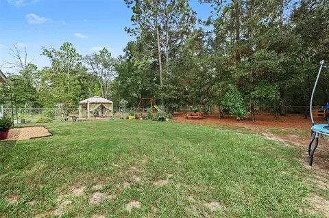 Exterior - 18018 SW 68th Loop, Dunnellon, FL 34432 photo 6 of 9