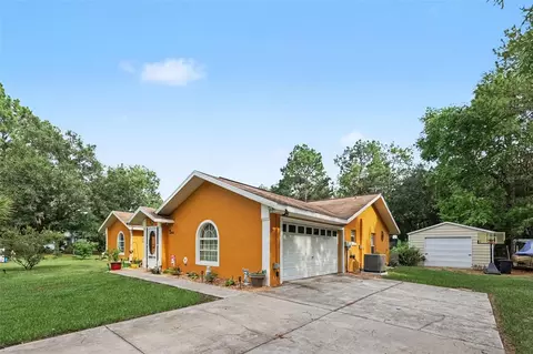 Exterior - 18018 SW 68th Loop, Dunnellon, FL 34432 photo 4 of 9