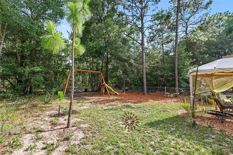 Exterior - 18018 SW 68th Loop, Dunnellon, FL 34432 photo 7 of 9