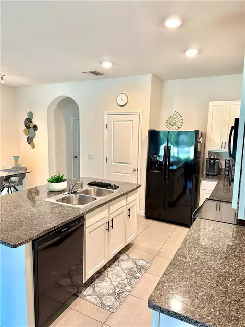 Kitchen - 8771 Falling Blue Pl, Riverview, FL 33578 photo 2 of 3