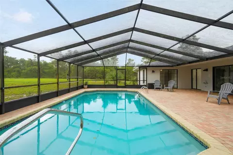 Exterior - 7231 River Country Dr, Weeki Wachee, FL 34607 photo 9 of 16