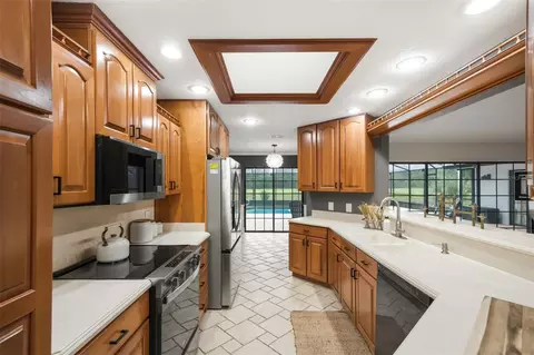 Kitchen - 7231 River Country Dr, Weeki Wachee, FL 34607 photo 2 of 6