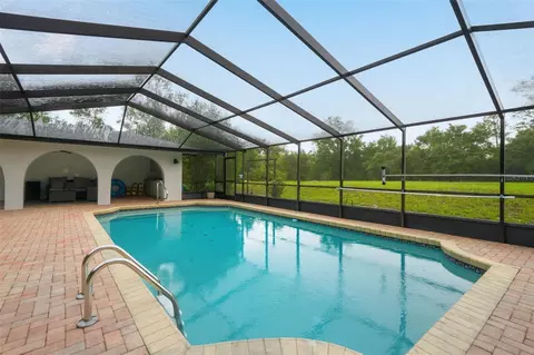 Exterior - 7231 River Country Dr, Weeki Wachee, FL 34607 photo 6 of 16