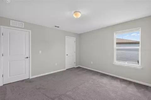 Bedroom - 6708 Devlin Ln, Wesley Chapel, FL 33545 photo 12 of 16
