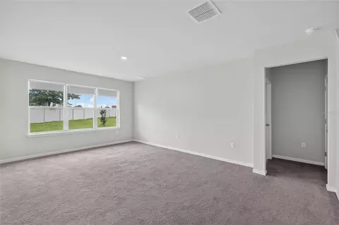 Living - 6708 Devlin Ln, Wesley Chapel, FL 33545 photo 5 of 13