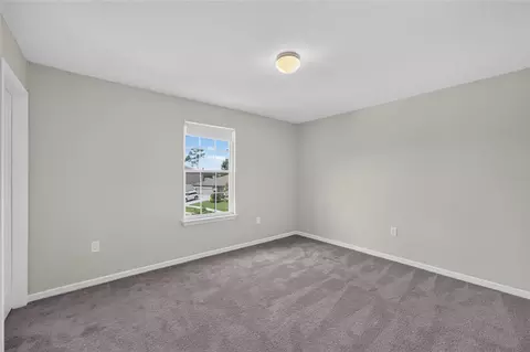 Bedroom - 6708 Devlin Ln, Wesley Chapel, FL 33545 photo 14 of 16