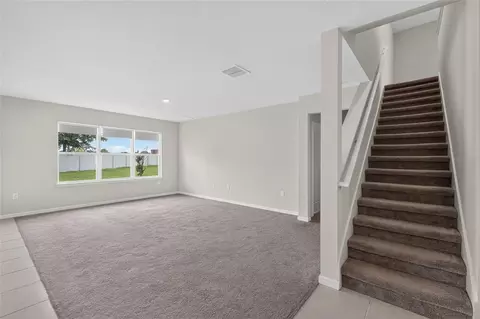 Living - 6708 Devlin Ln, Wesley Chapel, FL 33545 photo 6 of 13