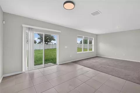 Living - 6708 Devlin Ln, Wesley Chapel, FL 33545 photo 7 of 13