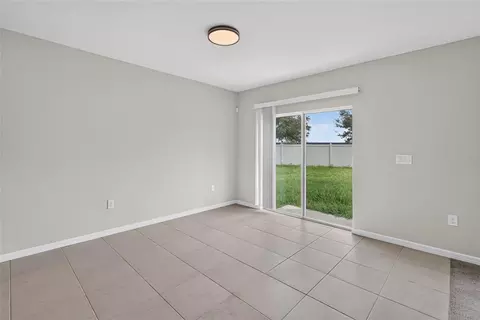 Living - 6708 Devlin Ln, Wesley Chapel, FL 33545 photo 8 of 13