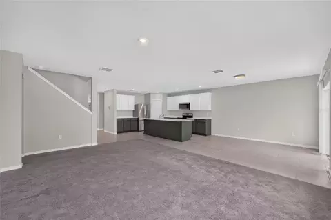 Living - 6708 Devlin Ln, Wesley Chapel, FL 33545 photo 9 of 13