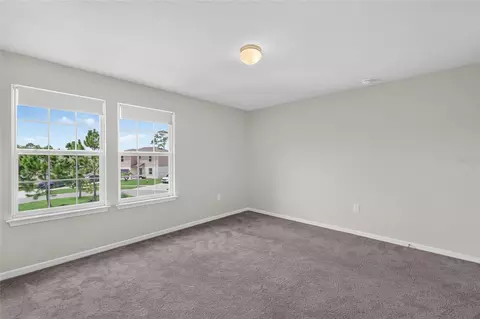 Bedroom - 6708 Devlin Ln, Wesley Chapel, FL 33545 photo 10 of 16