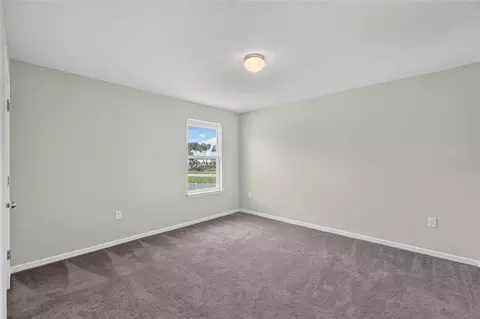 Bedroom - 6708 Devlin Ln, Wesley Chapel, FL 33545 photo 11 of 16